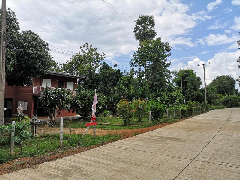 Land for sale 11 rai with a 2-story detached house, located by the river, offering a shady, Kanchanaburi