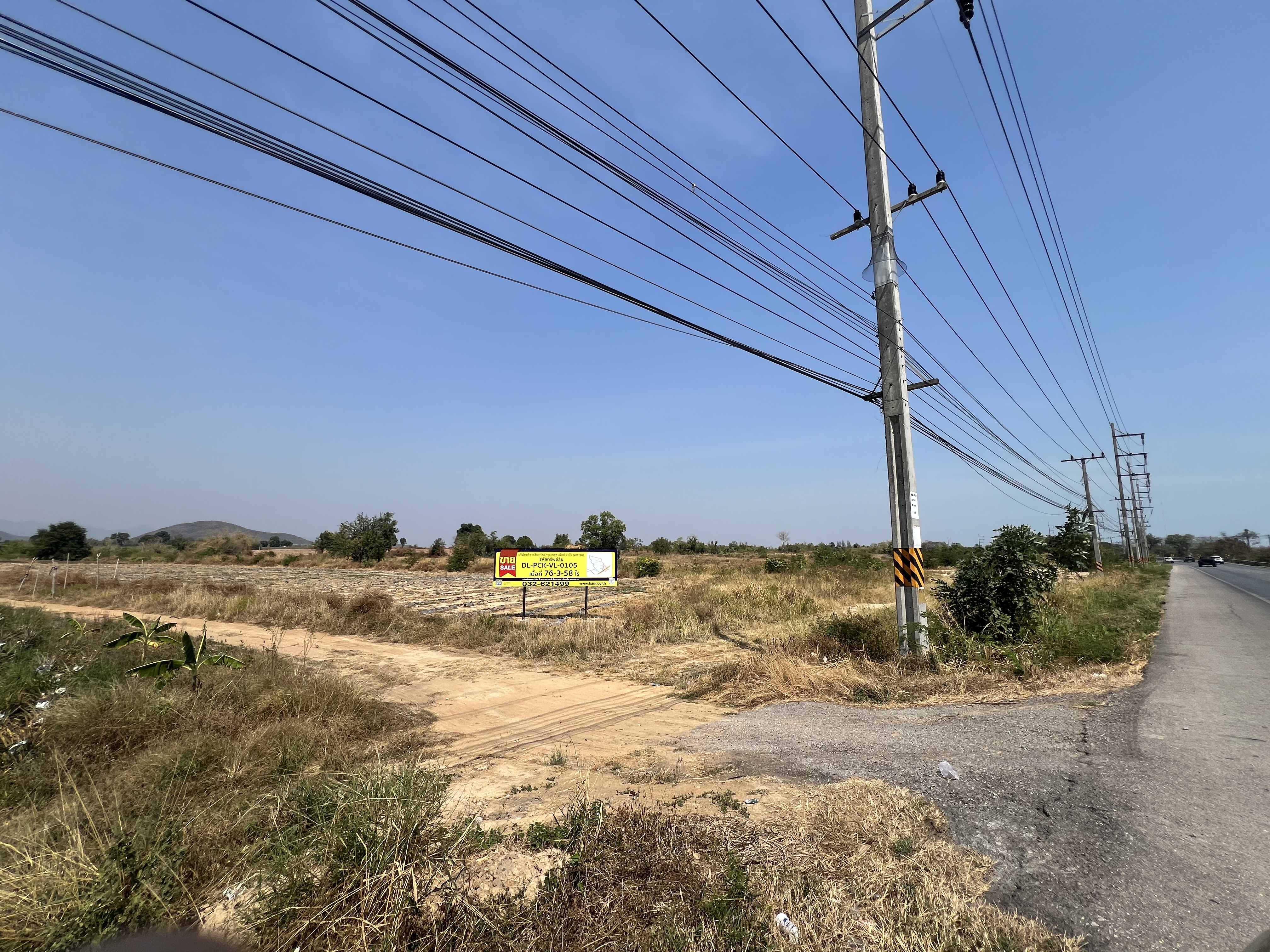 Plot of land for sale, located on Phetkasem Road, Bangkok's outer suburbs.