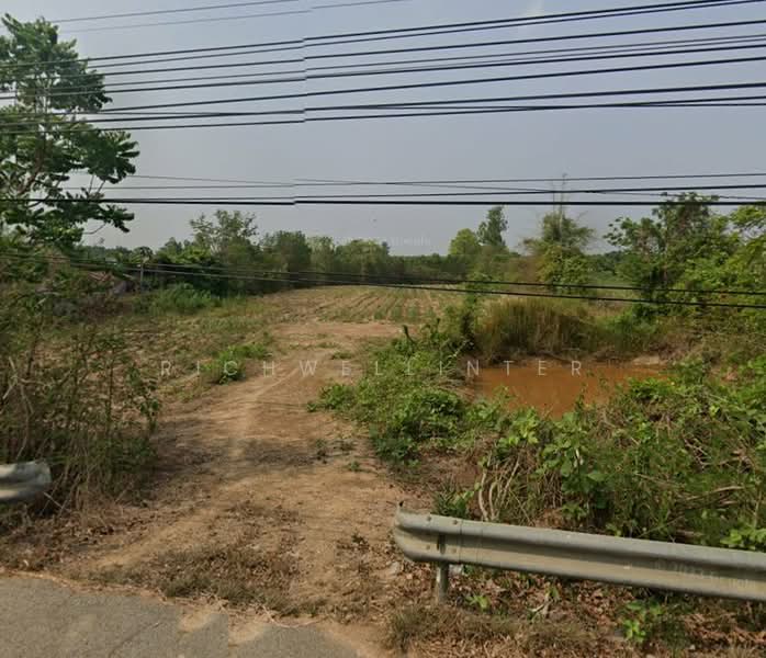 Land for sale in Khu Yai Mhee, 4 rai, adjacent to Road 3003, near Sanam Chai Khet market - 5 km., Chachoengsao